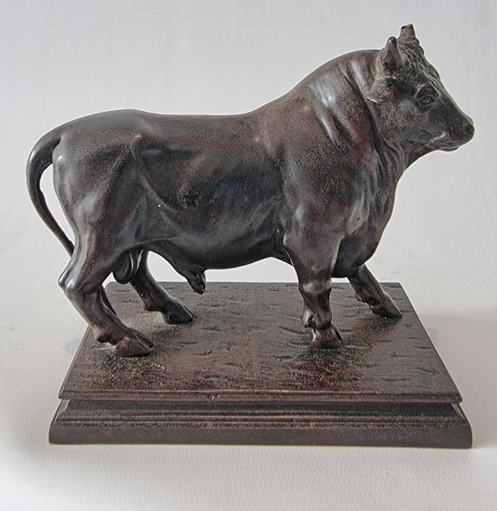 A Patinated Iron Sculpture of a Bull