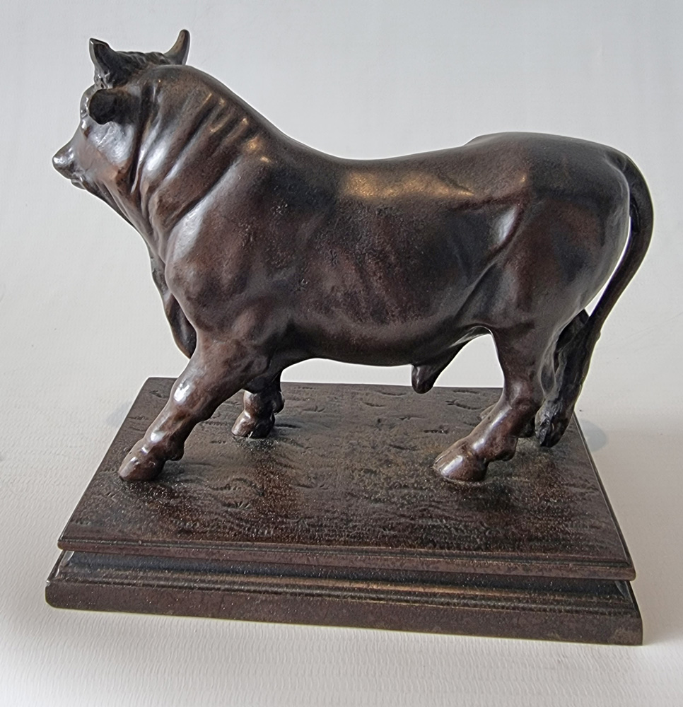 A Patinated Iron Sculpture of a Bull