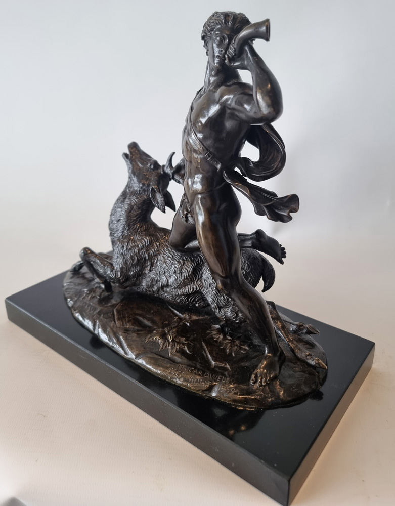 Antique Patinated Bronze  model of a huntsman and a stag by Holme Cardwell