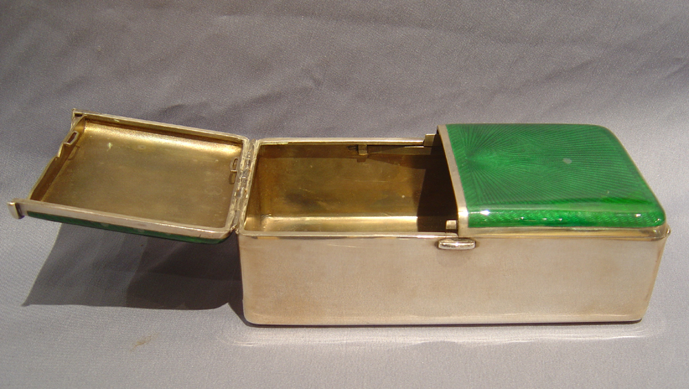 Antique silver and green guilloche enamel cigarette box.