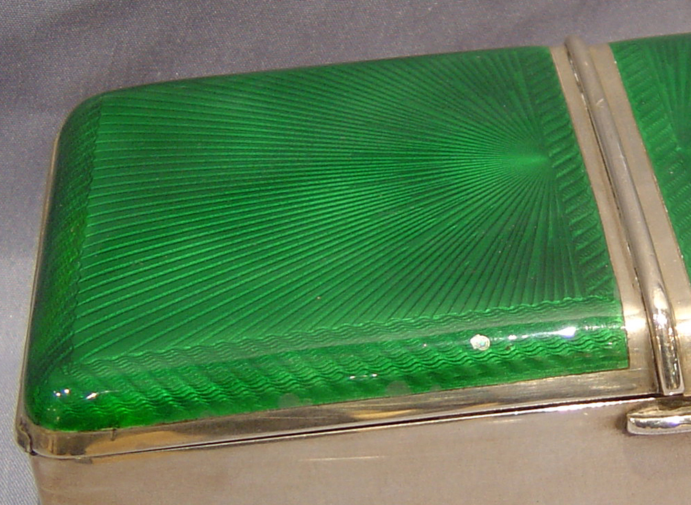 Antique silver and green guilloche enamel cigarette box.