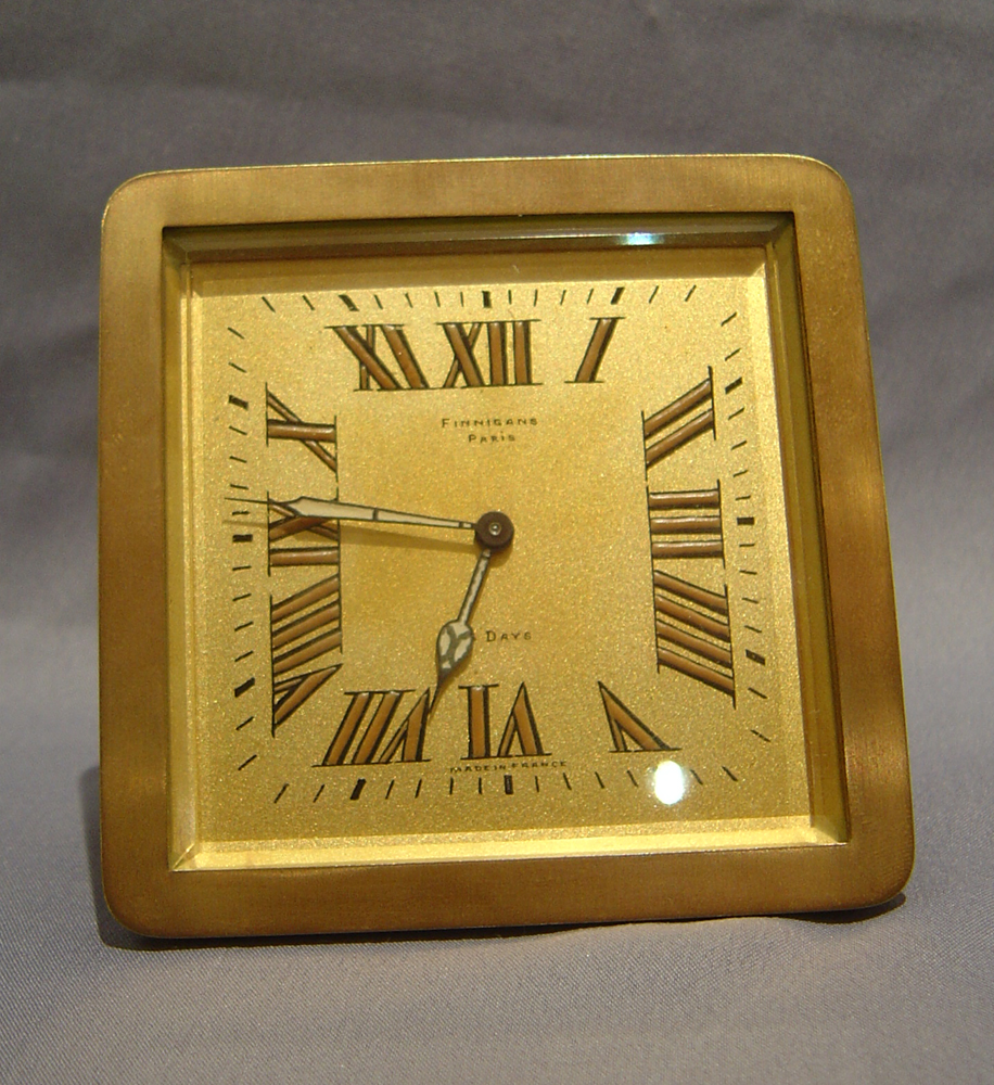 Gilt bronze strut clock by Finnegan, London.