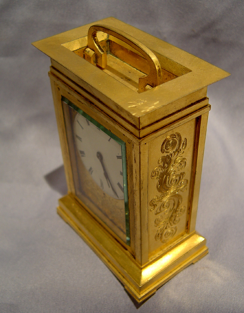 Antique English fusee ormolu carriage clock.