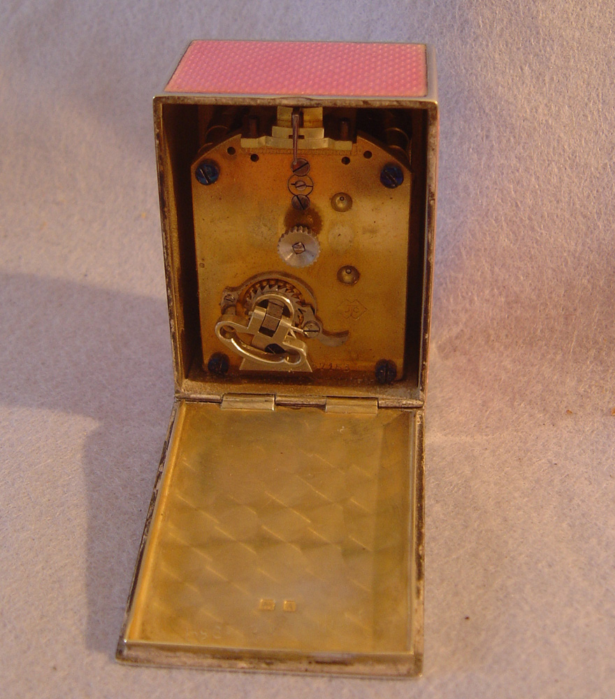 Antique Swiss silver & pink guilloche enamel boudoir clock in leather case.