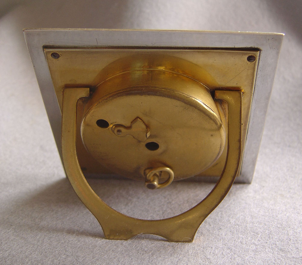 Blue guilloche  enamel and silver strut clock in original case.