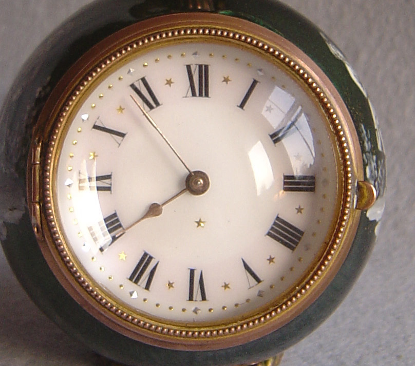 Unusual bubble clock in green enamel overpainted in grisaille.