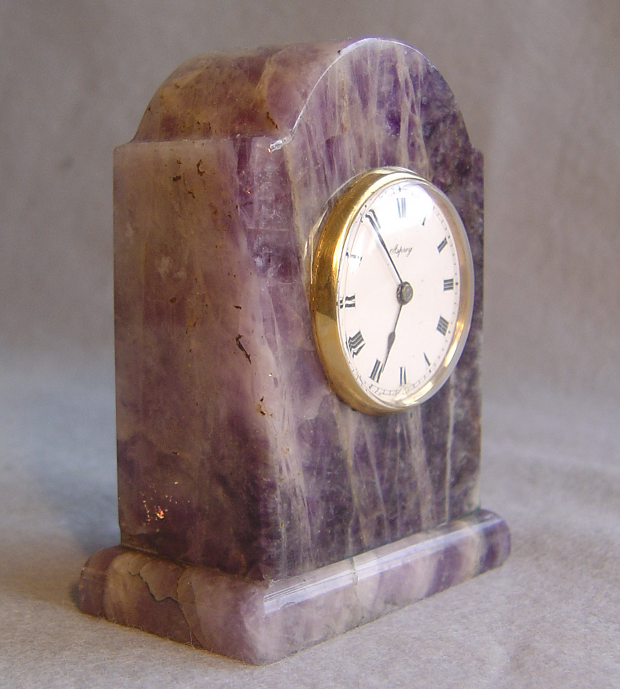 Silver gilt and amethyst cased Aspreys boudoir clock.