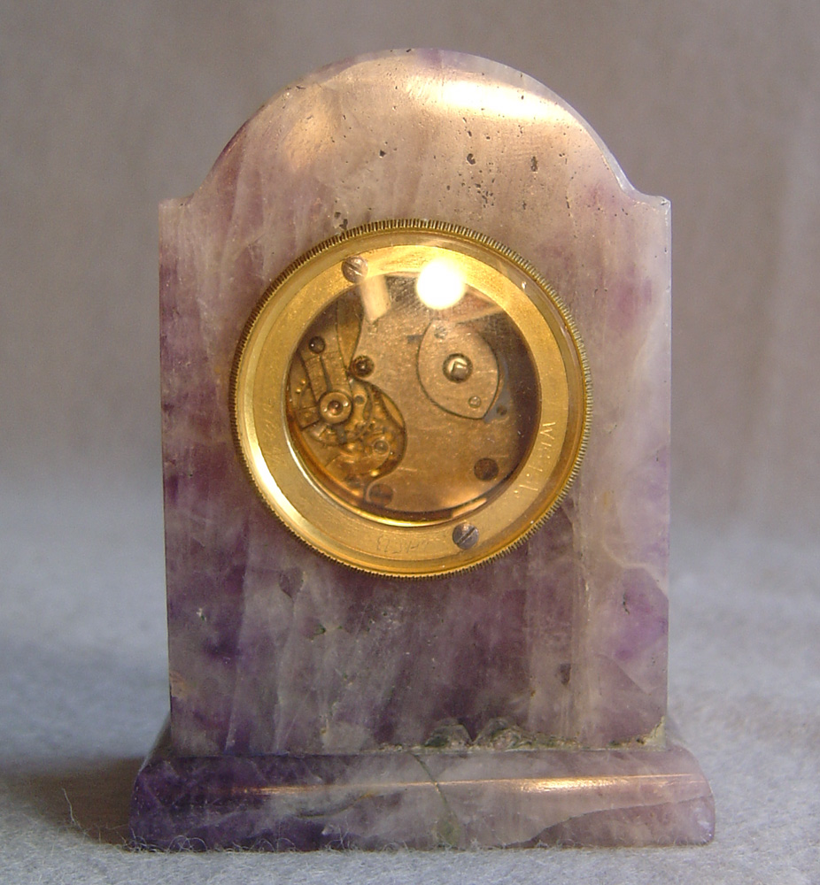 Silver gilt and amethyst cased Aspreys boudoir clock.