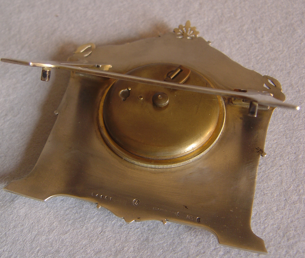 Fine Swiss silver and guilloche enamel strut clock.