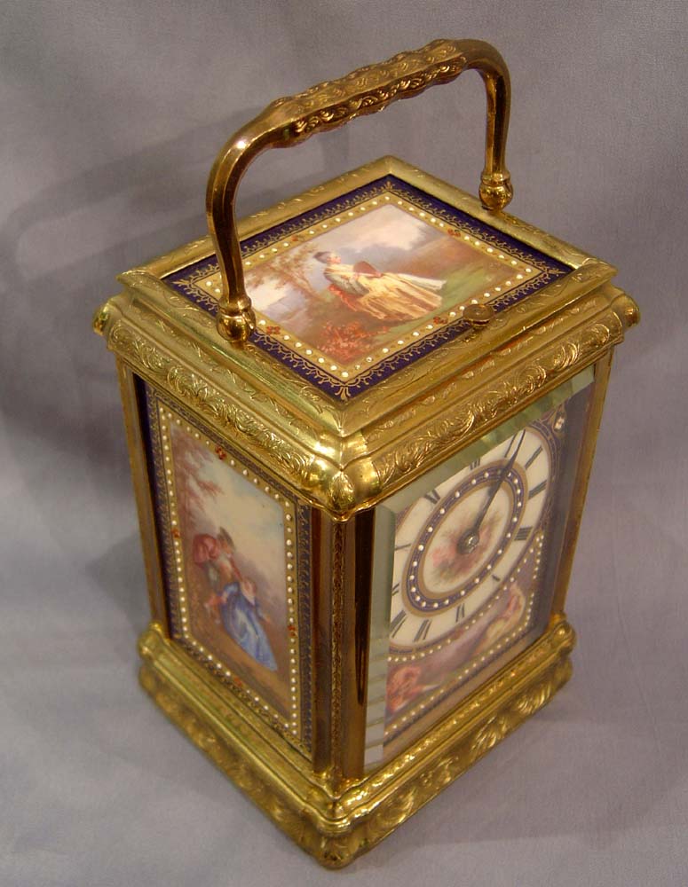 Porcelain panelled carriage clock with engraved 