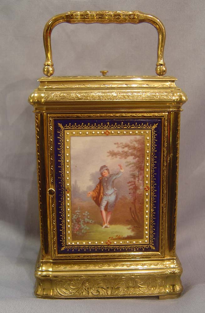 Porcelain panelled carriage clock with engraved 