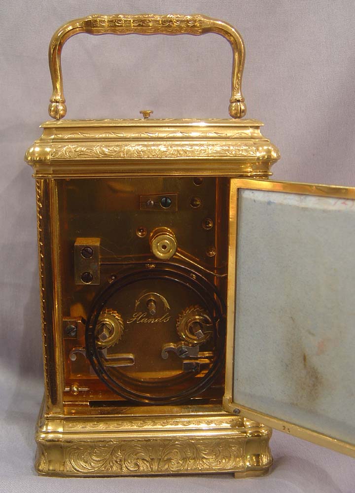 Porcelain panelled carriage clock with engraved 
