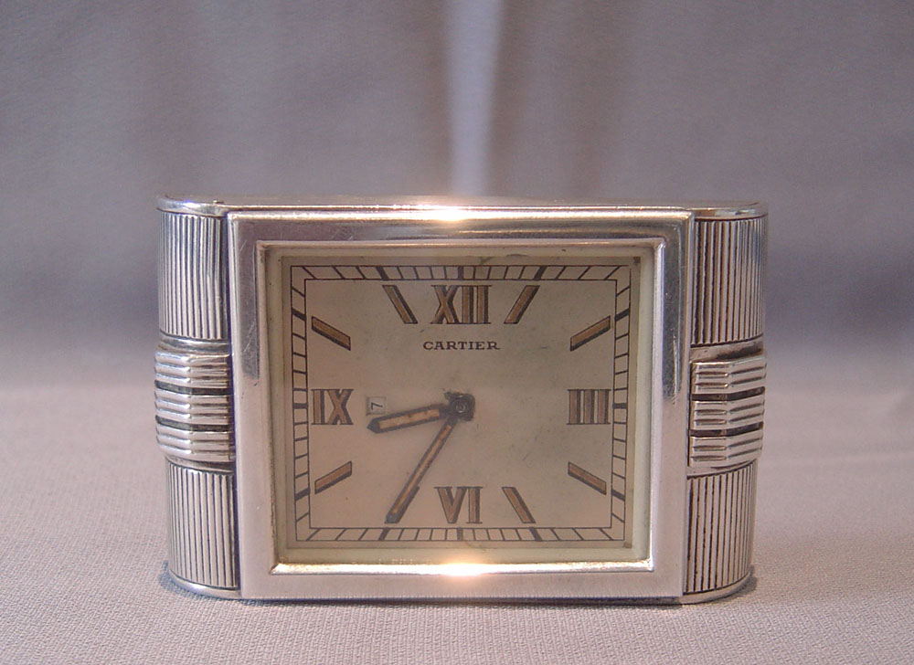 Silver Cartier Art Deco strut clock in silver hallmarked 1935.