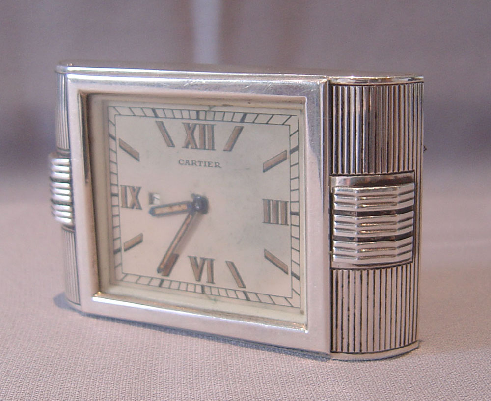 Silver Cartier Art Deco strut clock in silver hallmarked 1935.