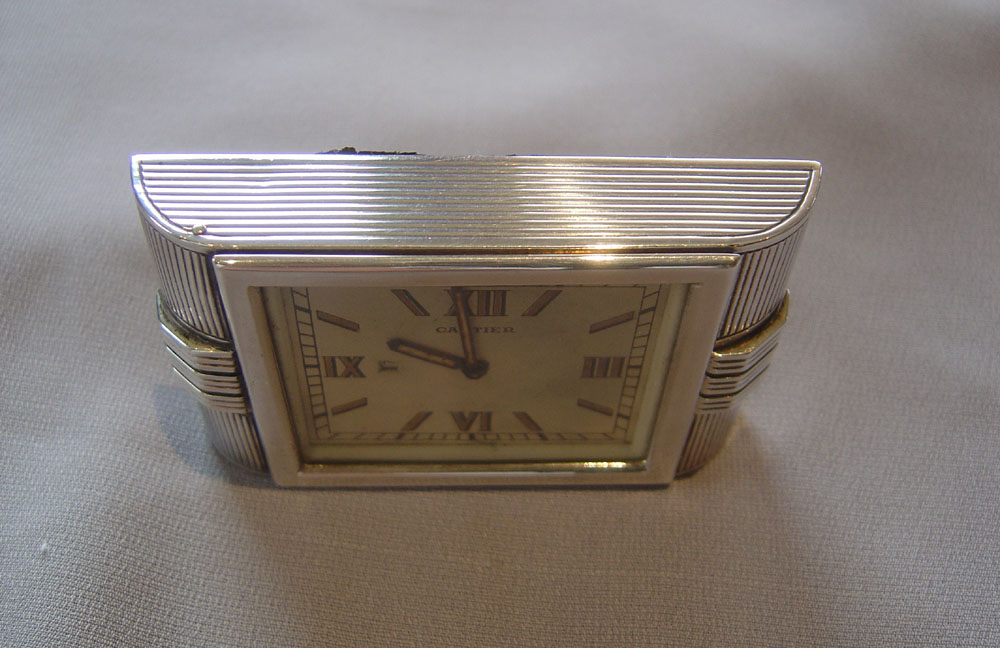 Silver Cartier Art Deco strut clock in silver hallmarked 1935.