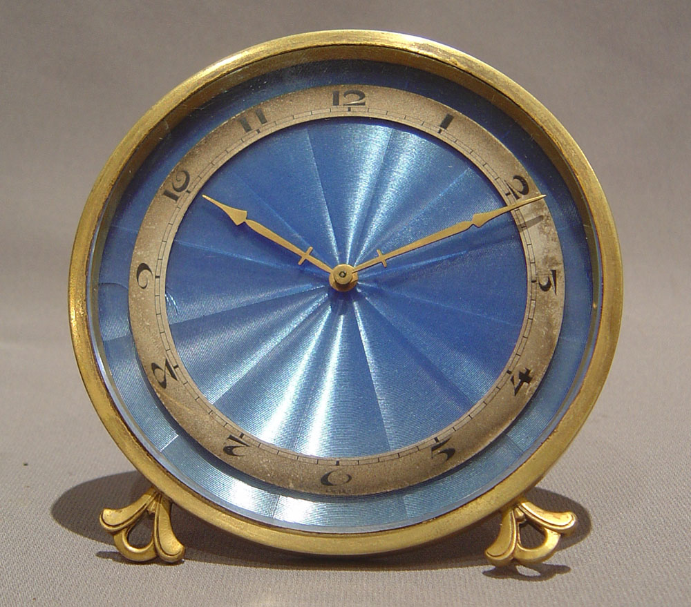 A good Swiss strut clock with blue enamel dial.