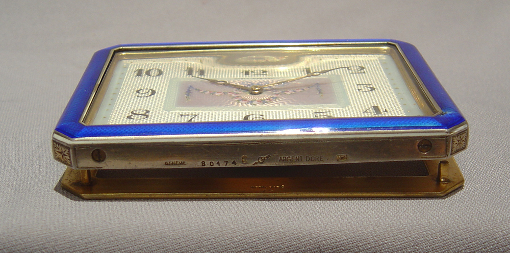 A Swiss blue enamel and gilt bronze 8 day strut clock.
