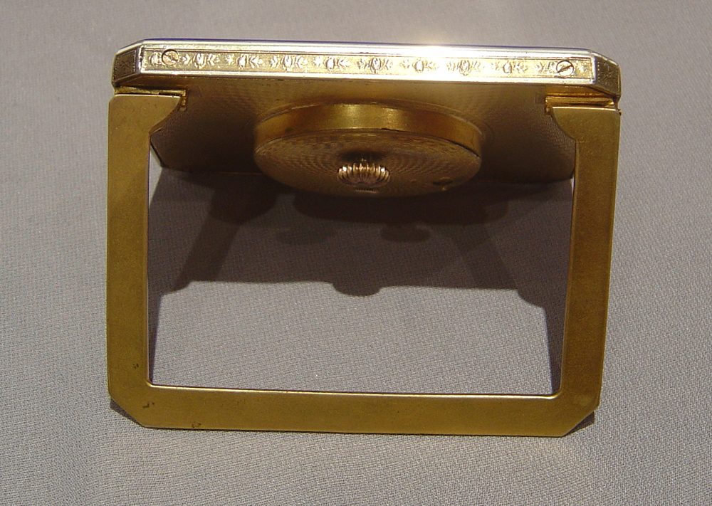 A Swiss blue enamel and gilt bronze 8 day strut clock.