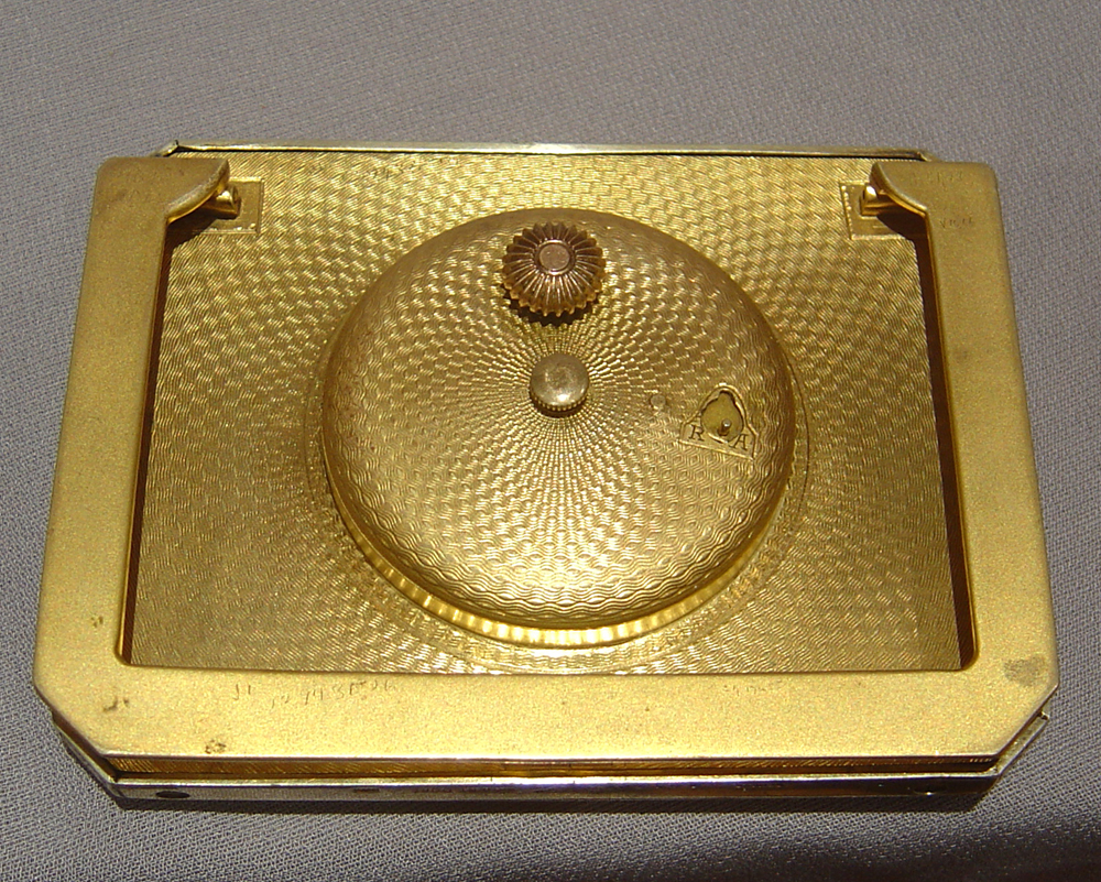 A Swiss blue enamel and gilt bronze 8 day strut clock.