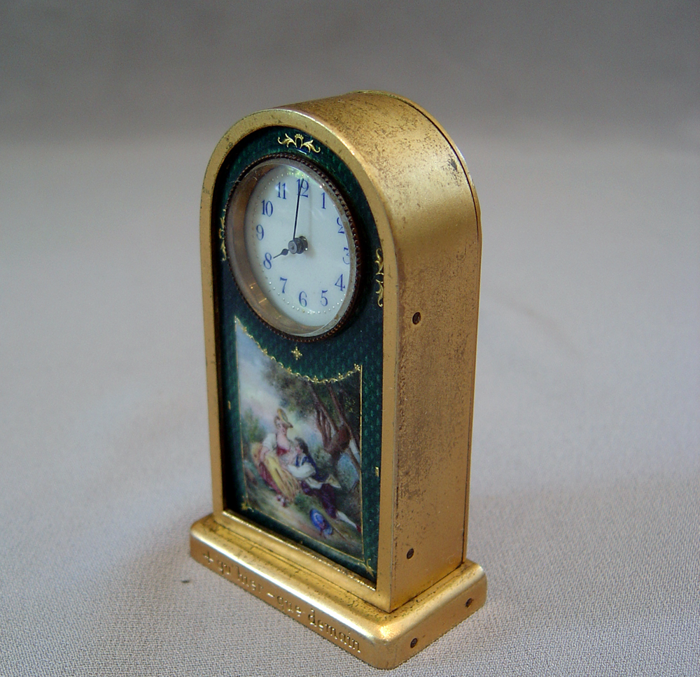Gilt bronze and enamel miniature carriage clock.