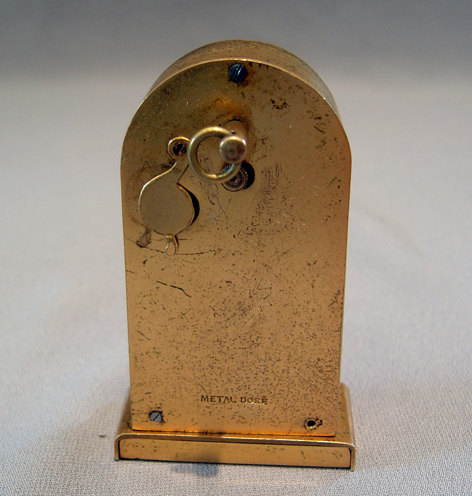 Gilt bronze and enamel miniature carriage clock.