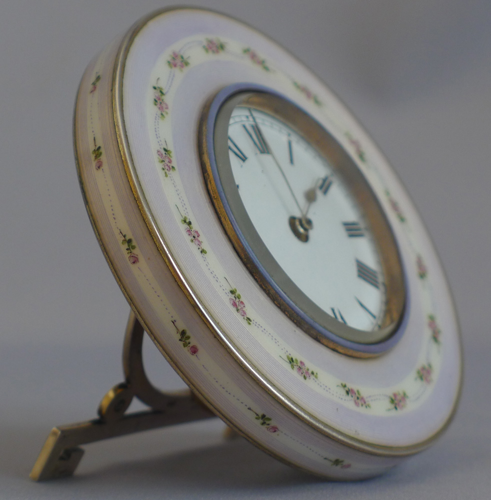 Silver and enamel paperweight clock with lavender border and roses.