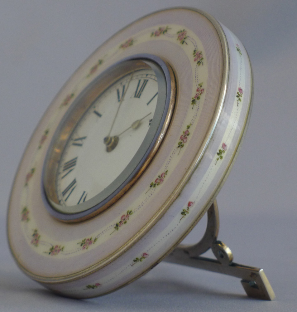 Silver and enamel paperweight clock with lavender border and roses.