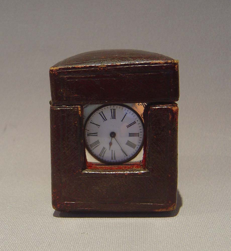 Antique victorian silver carriage clock, engraved decoration and with original travelling case.