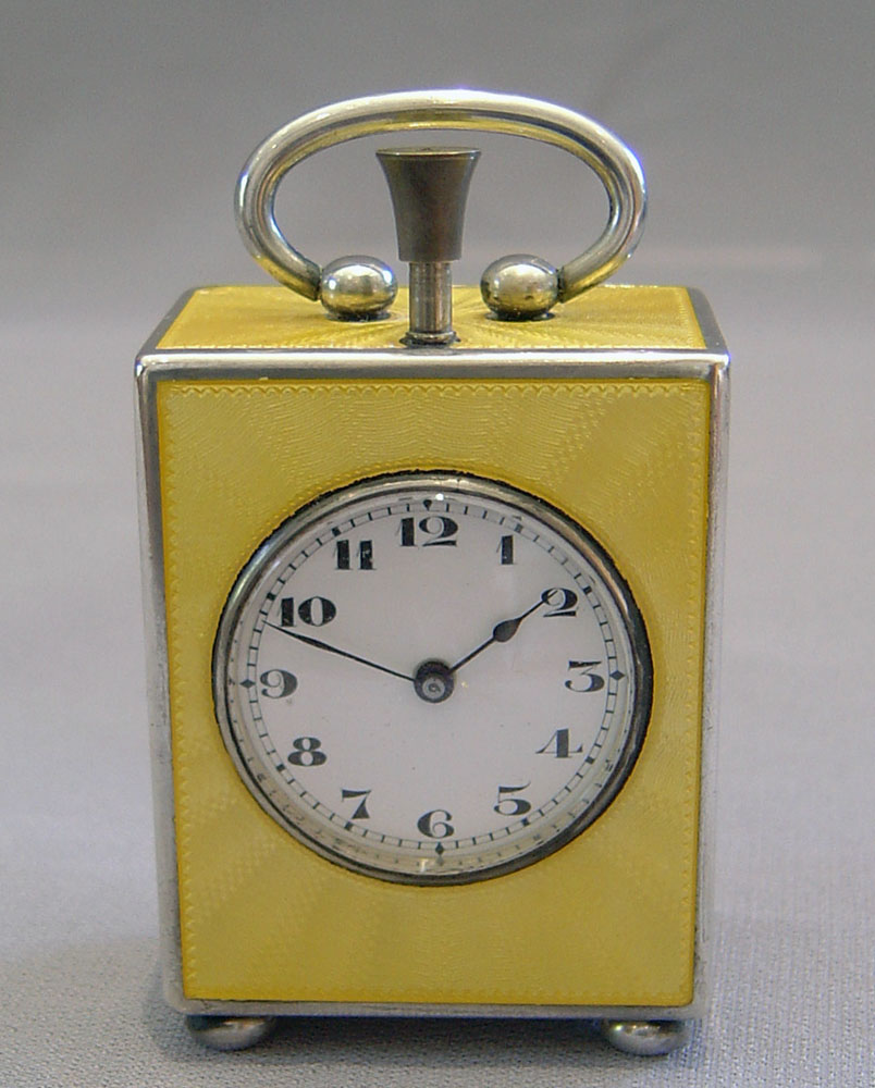 Fine silver and Imperial yellow guilloche enamel 1/4 repeater in carrying case.