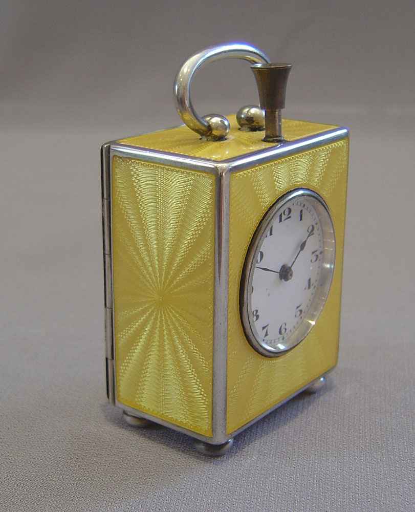 Fine silver and Imperial yellow guilloche enamel 1/4 repeater in carrying case.