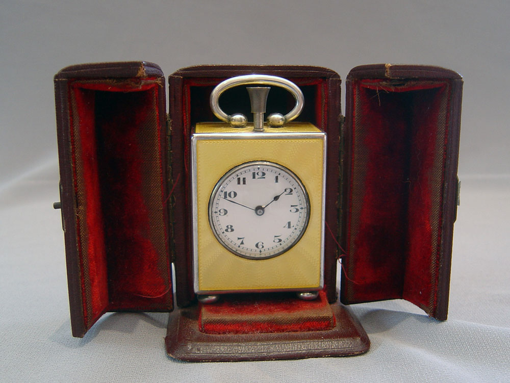 Fine silver and Imperial yellow guilloche enamel 1/4 repeater in carrying case.