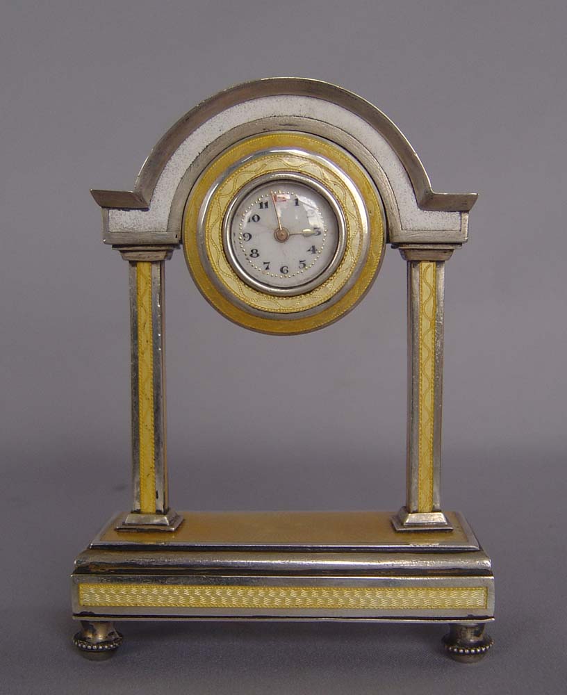 Antique guilloch enamel and silver portico clock.