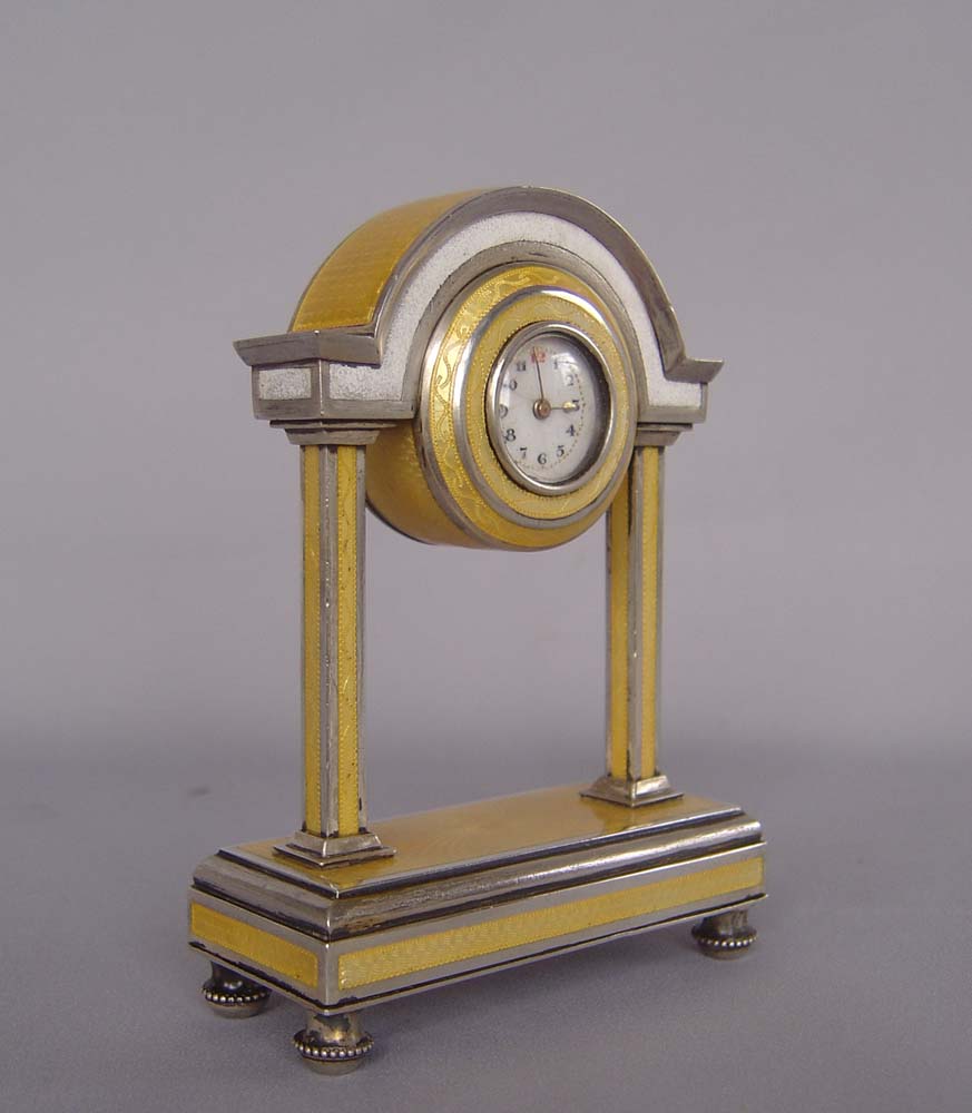 Antique guilloch enamel and silver portico clock.