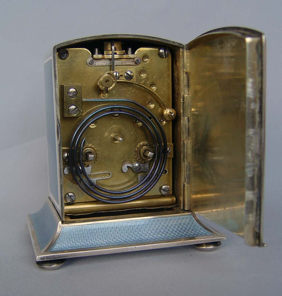 Magnificent silver and grey guilloche enamel large size striking carriage clock.