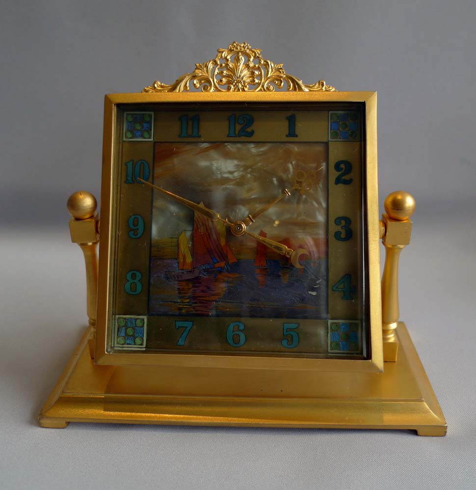 Mother of pearl, enamel and gilt bronze English boudoire clock.
