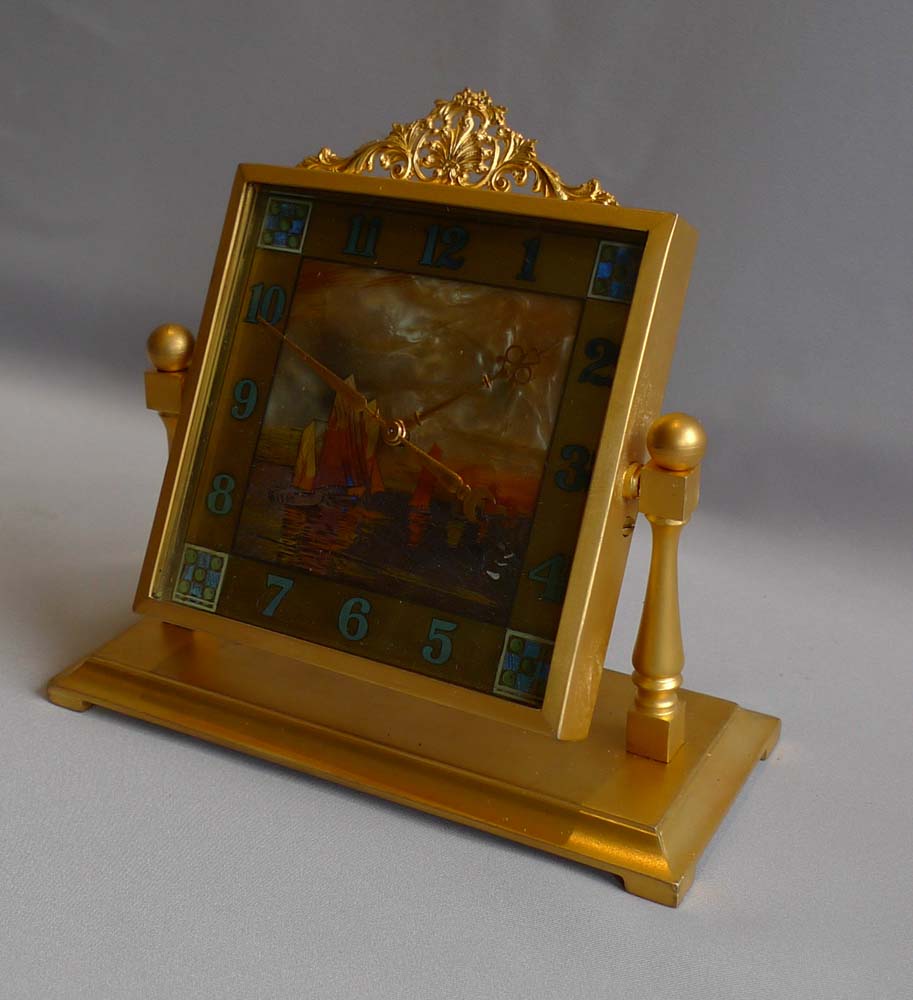 Mother of pearl, enamel and gilt bronze English boudoire clock.
