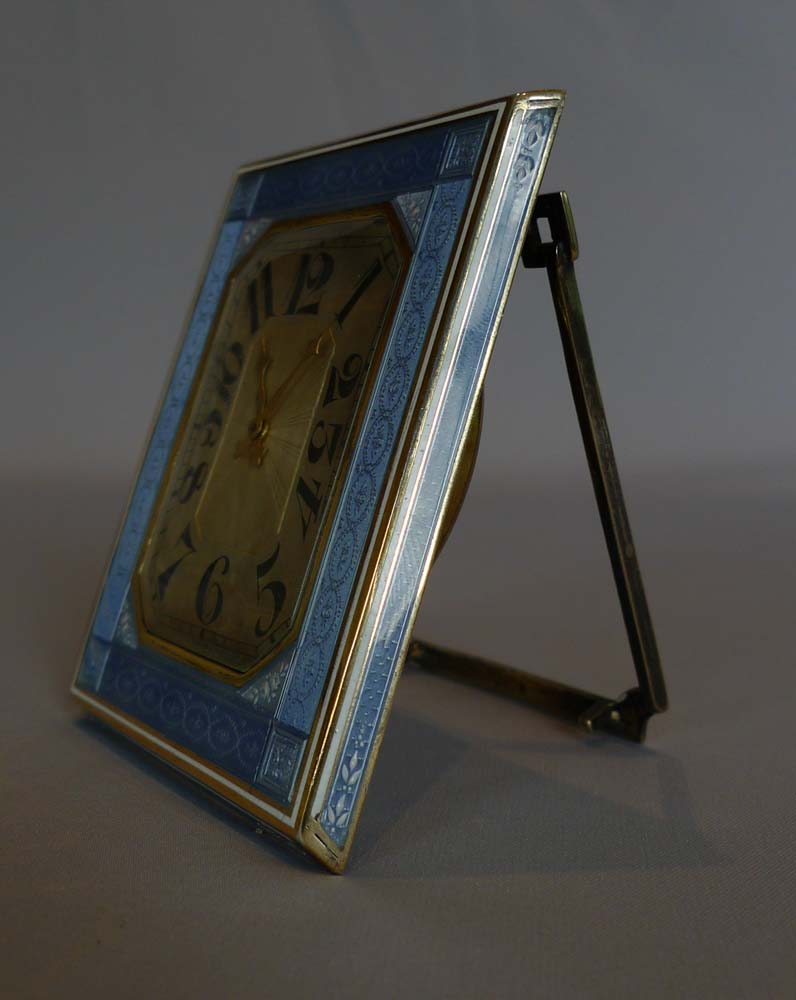 Guilloche enamel and silver, heavy strut clock.