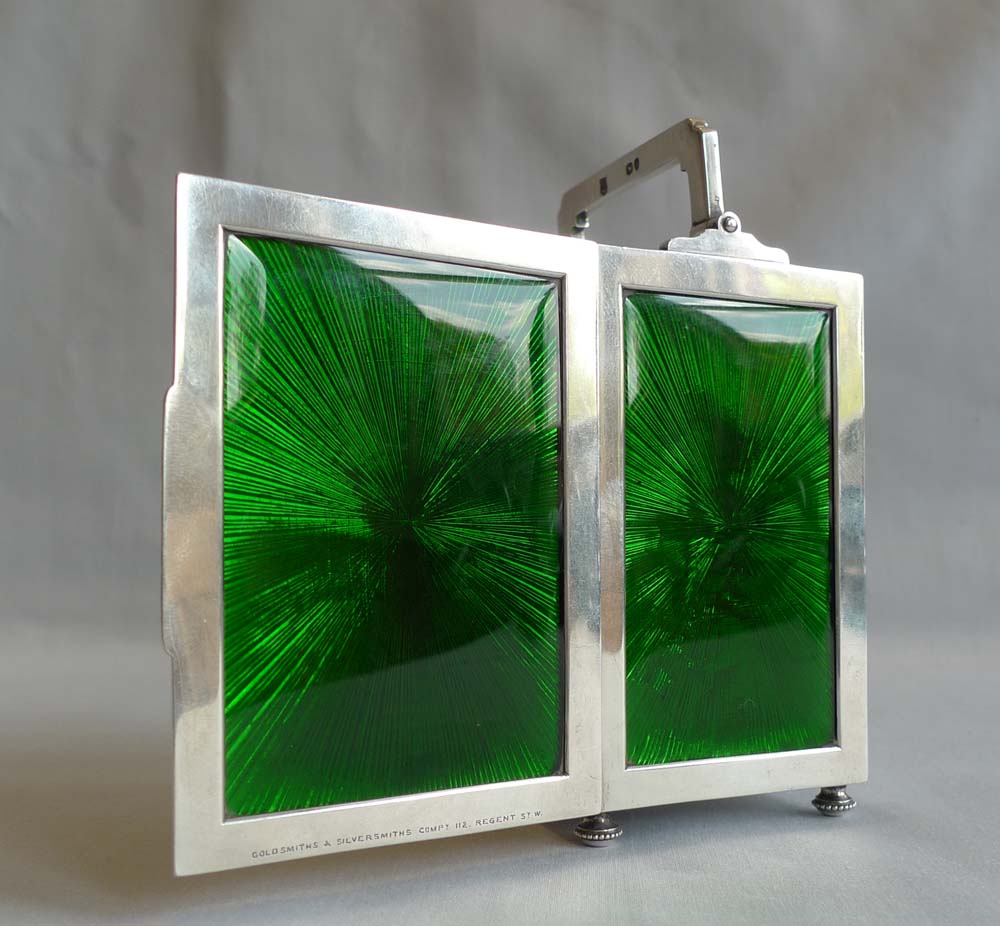Silver and green guilloche enamel English carriage clock by Goldsmiths & Silversmiths Comp.