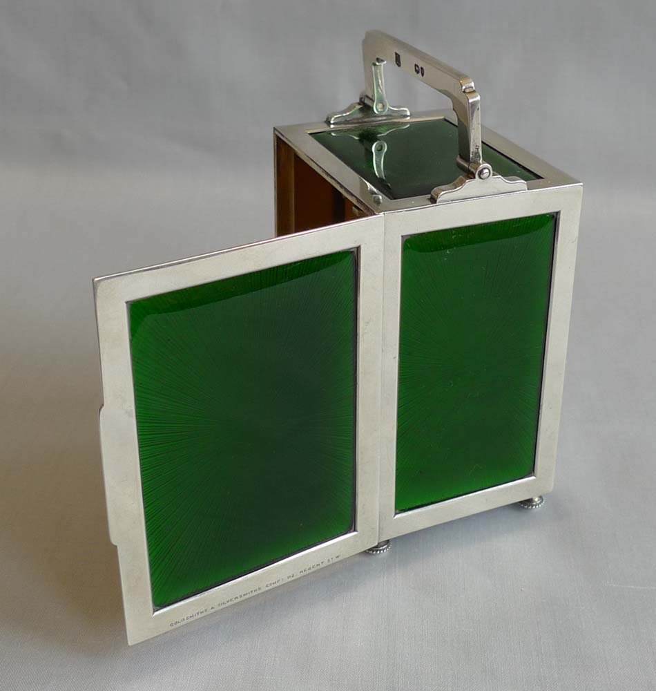 Silver and green guilloche enamel English carriage clock by Goldsmiths & Silversmiths Comp.