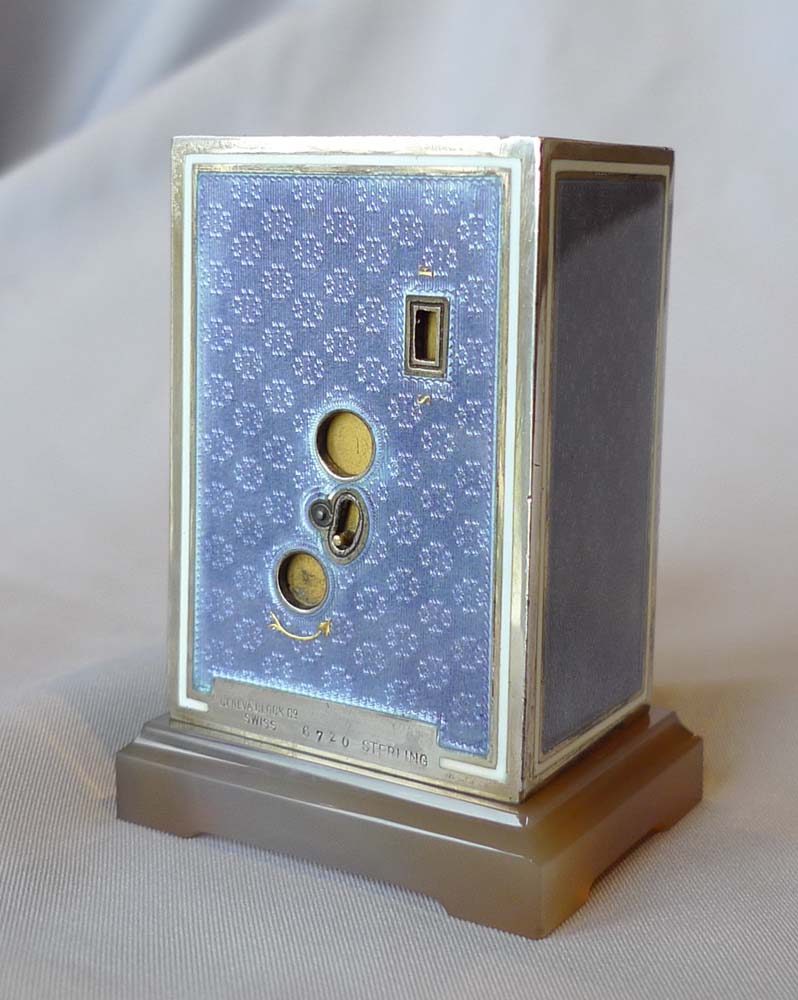 Silver and purple guilloche enamel boudoir clock with Chalcedony base.
