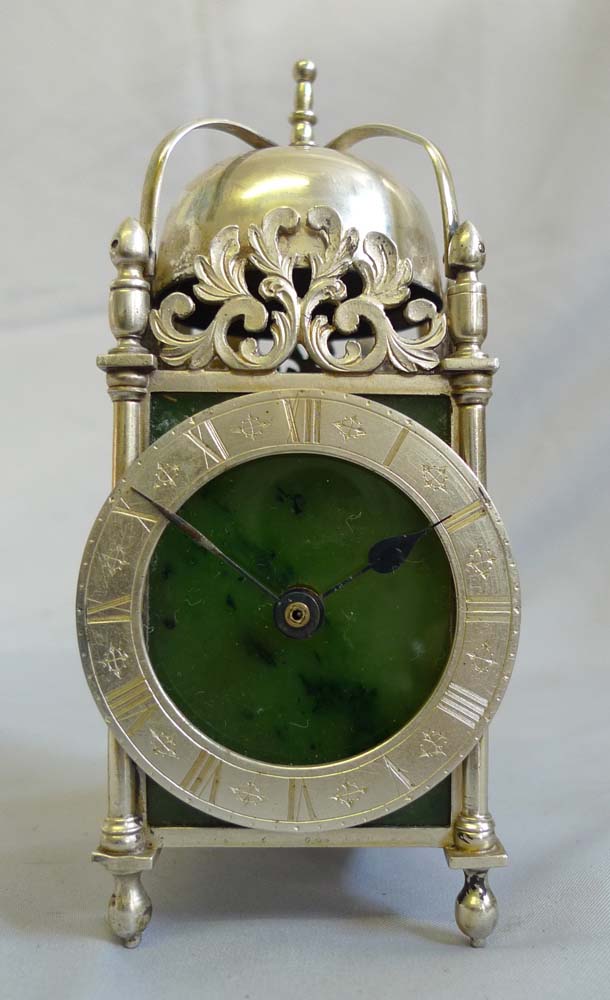 Antique Asprey solid silver and moss agate mantel clock in form of a lantern clock.