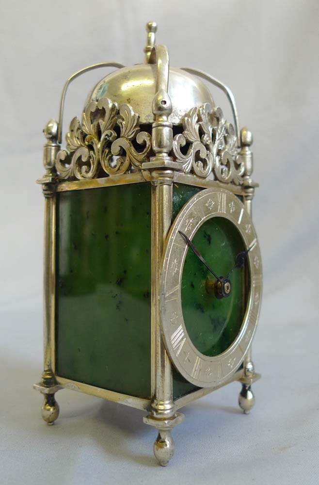 Antique Asprey solid silver and moss agate mantel clock in form of a lantern clock.