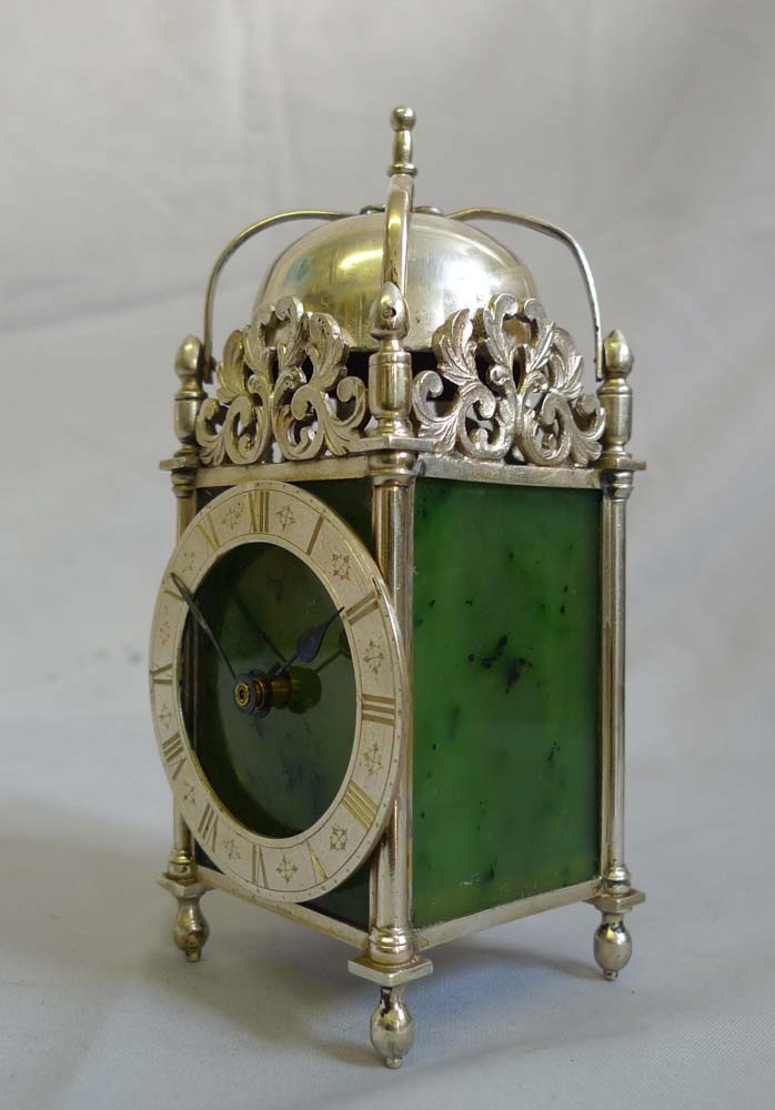 Antique Asprey solid silver and moss agate mantel clock in form of a lantern clock.