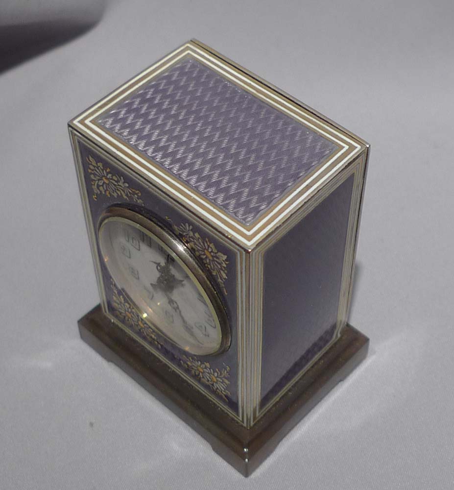Antique rare guilloche enamell and silver gilt timepiece alarm signed Mathey in fitted case.