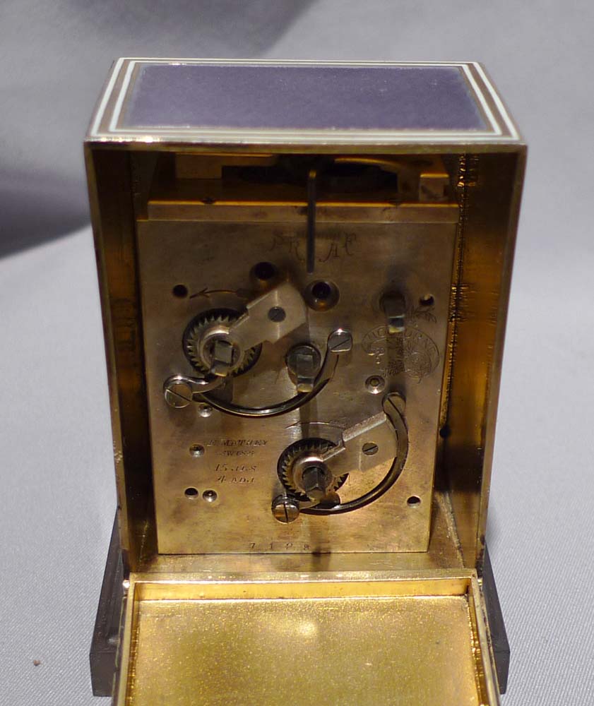 Antique rare guilloche enamell and silver gilt timepiece alarm signed Mathey in fitted case.