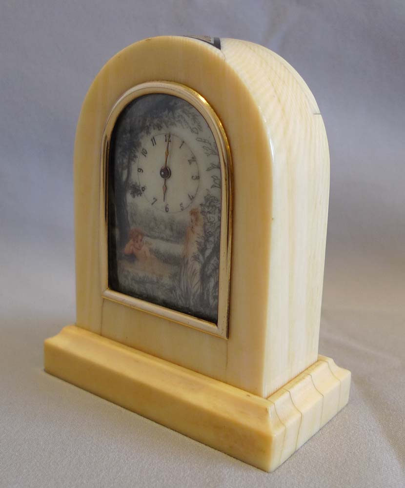 Ivory and gold mounted miniature carriage or boudoir clock