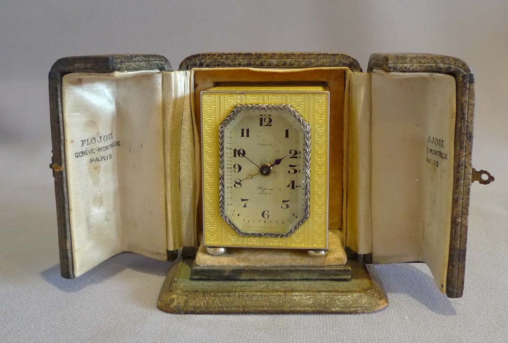 guilloche enamel and silver sub miniature carriage clock with alarm.
