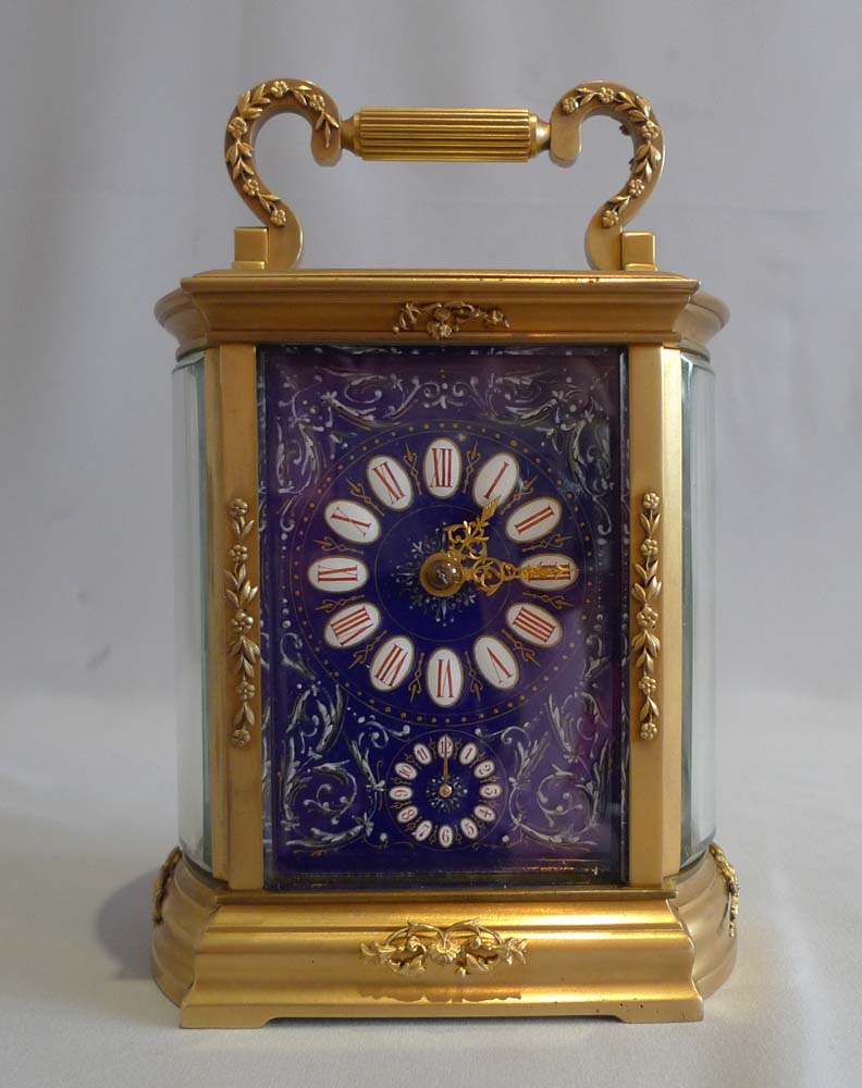 Good French carriage clock with blue enamel dial and strike and alarm function.