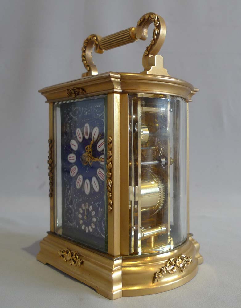 Good French carriage clock with blue enamel dial and strike and alarm function.