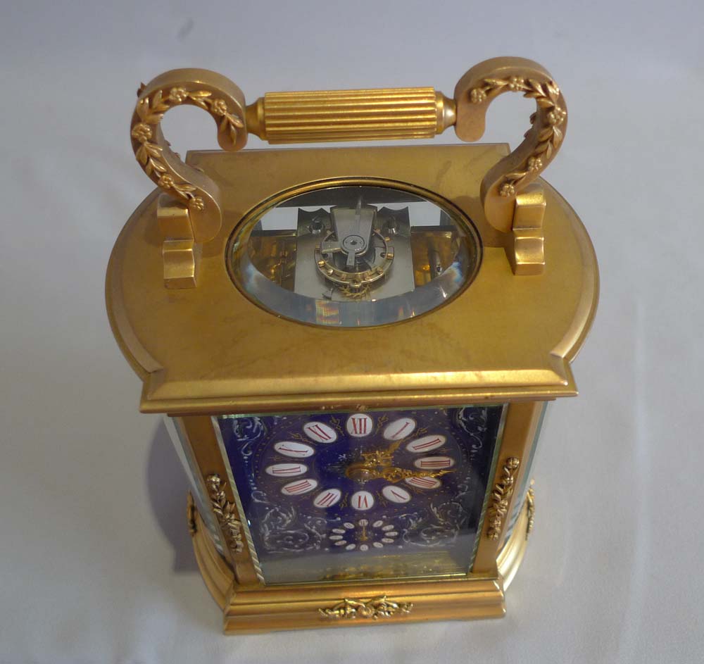 Good French carriage clock with blue enamel dial and strike and alarm function.